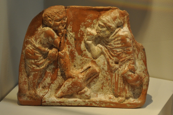 Pella, Relief of two talking women