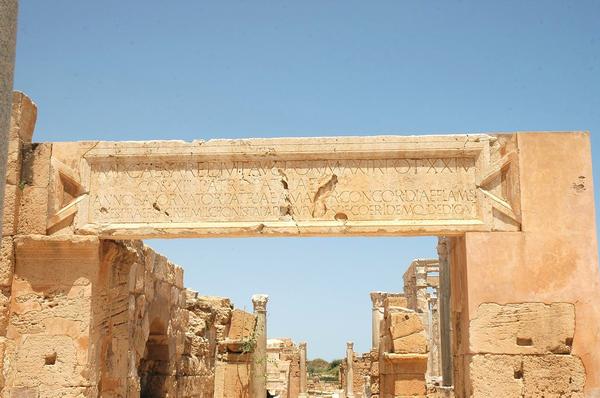 Lepcis, Theater, entrance inscription (IRT 323)