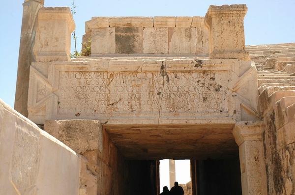 Lepcis, Theater, entrance inscription (IRT 322)